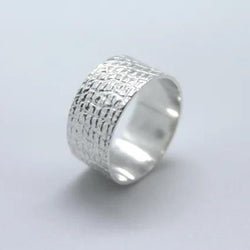 Skin textured wide silver band