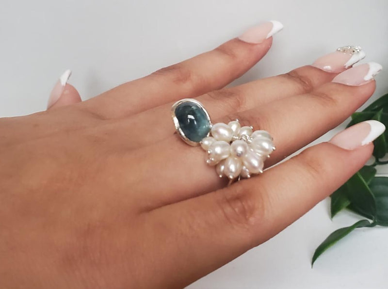 Aquamarine and pearl ring