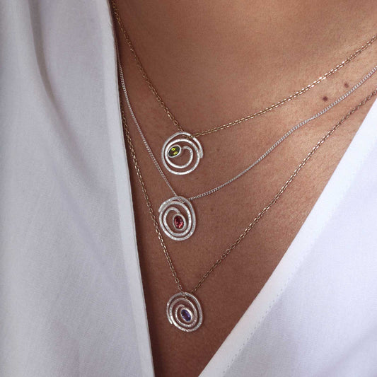 Spiral gemstone pendant